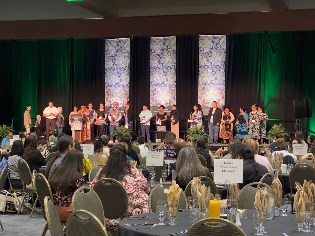 A group stands on stage to perform during the awards ceremony 